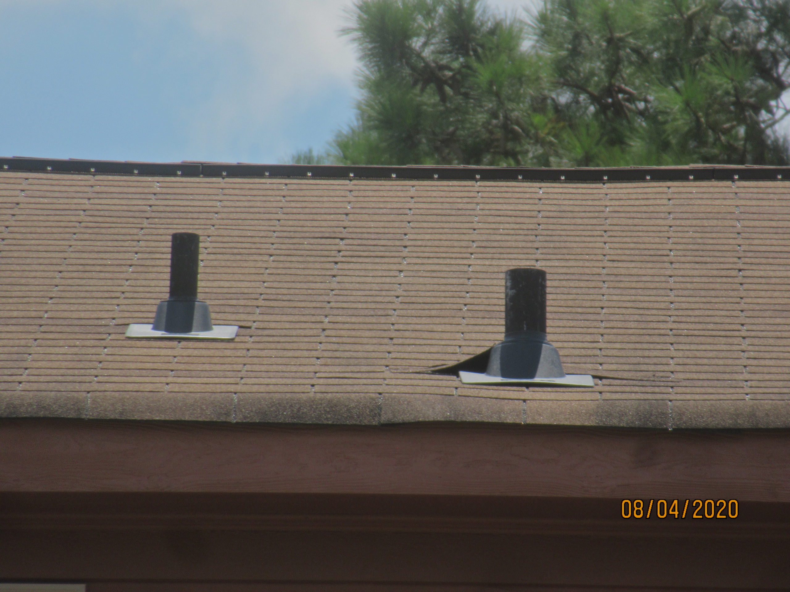 Raised shingles on vent pipe