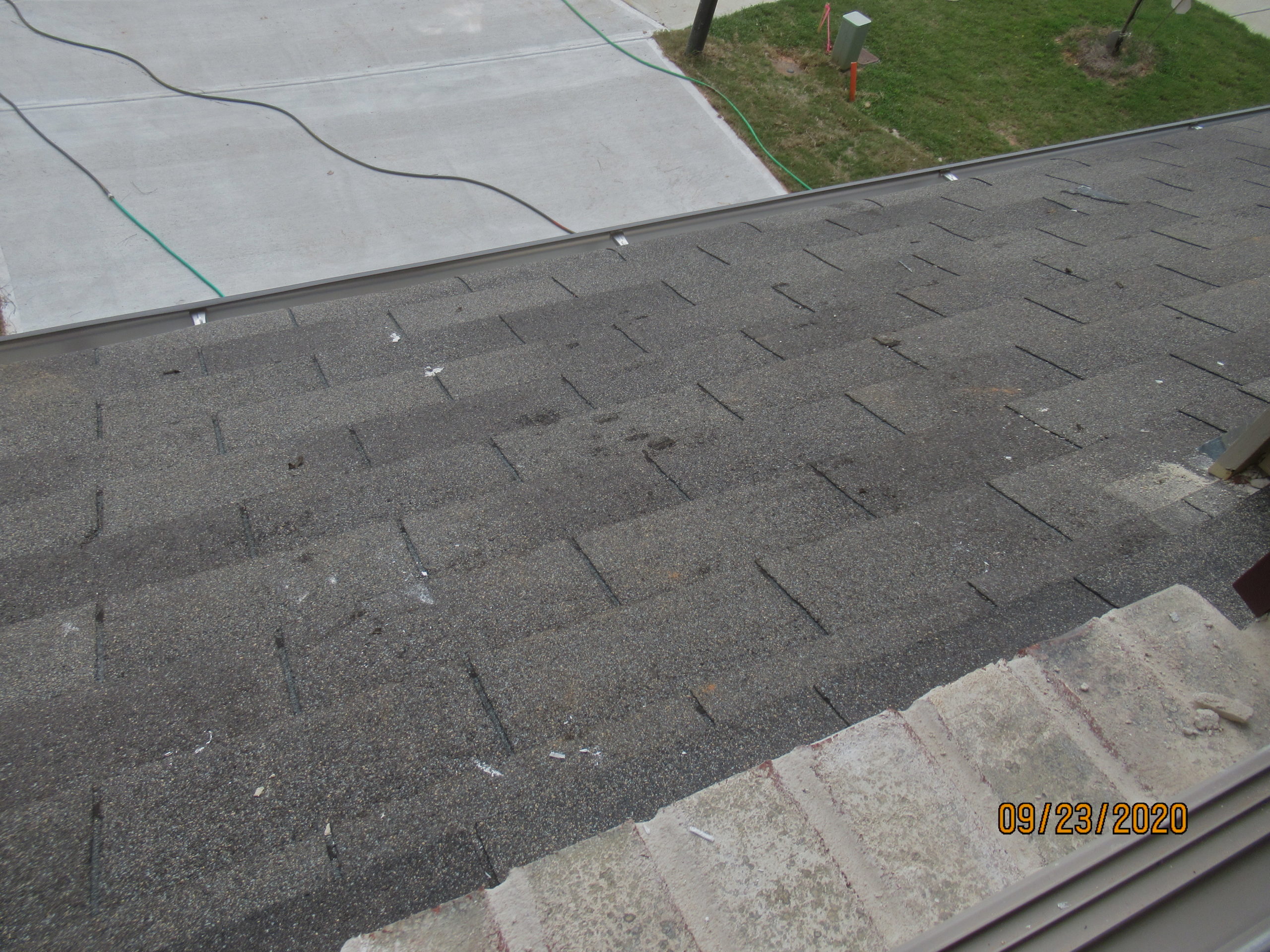 Damaged roof shingles