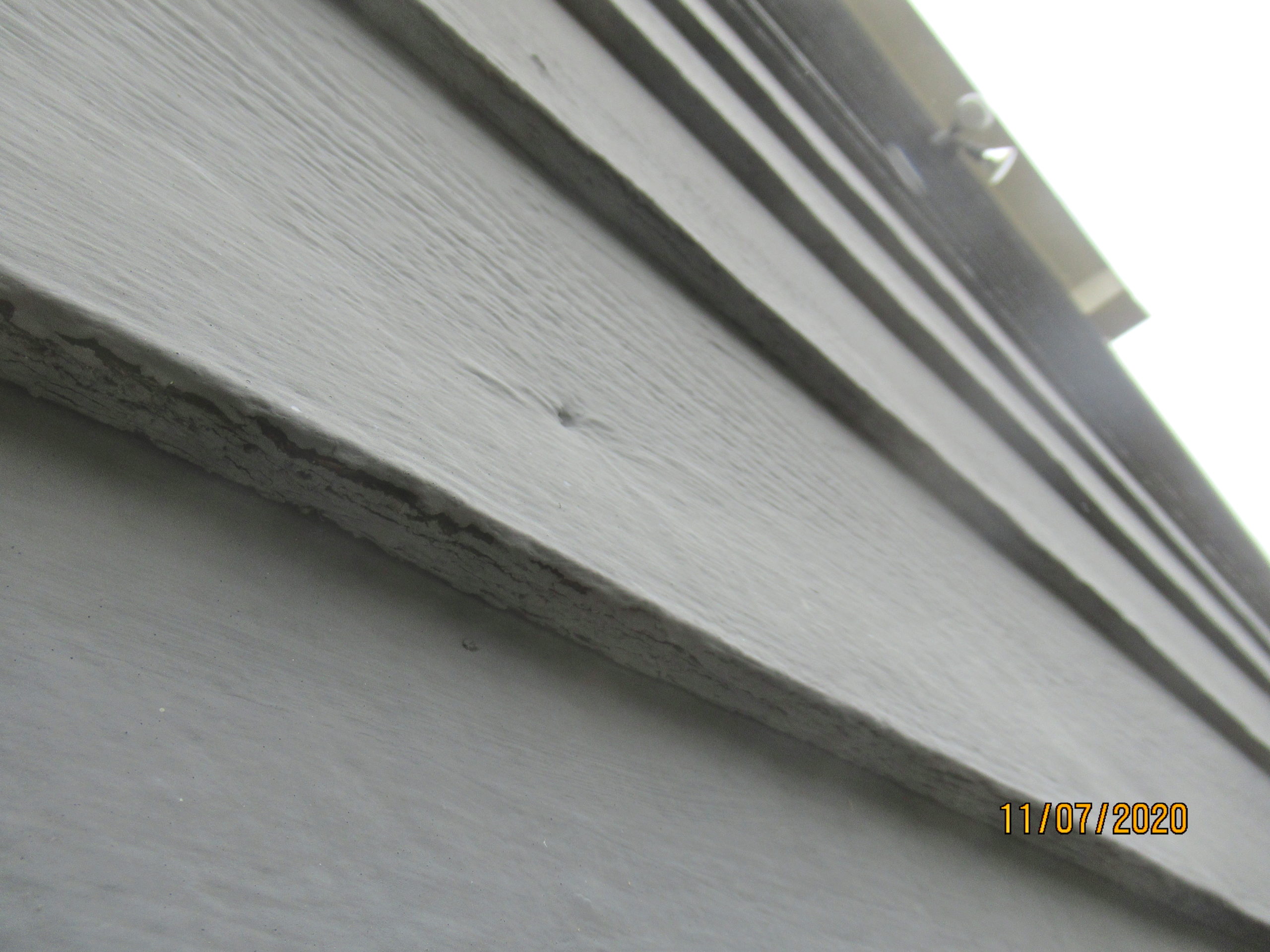 Rotten wood fiber board siding